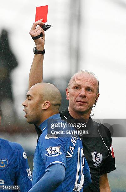 Portsmouth's Belgian defender Anthony Vanden Borre is sent off by Referee Steve Bennett during the English Premier League football match between...