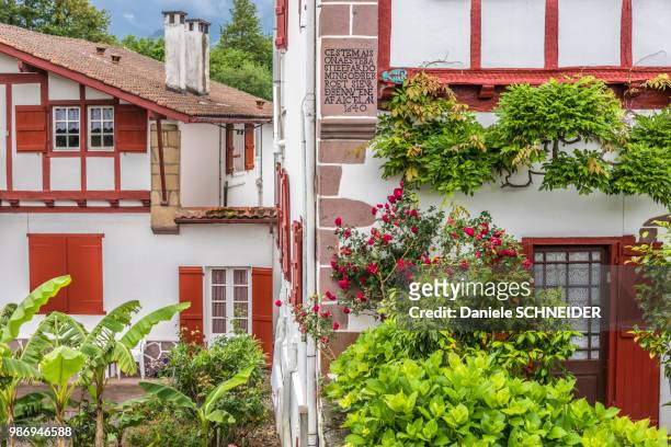 france, pyrenees atlantiques, basque country, ainhoa, half-timbered houses (17th and 18th century), (labelled "most beautiful village in france") - pays basque stock pictures, royalty-free photos & images