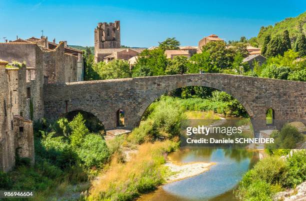 france, aude, lagrasse, bridge over the orbieu river, labbelled "most beautiful village in france - circa 7th century stock pictures, royalty-free photos & images