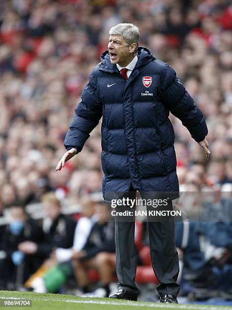 Arsenal's French manager Arsene Wenger gstures during the English Premier League football match between Arsenal and Wolverhampton Wanderers at The...