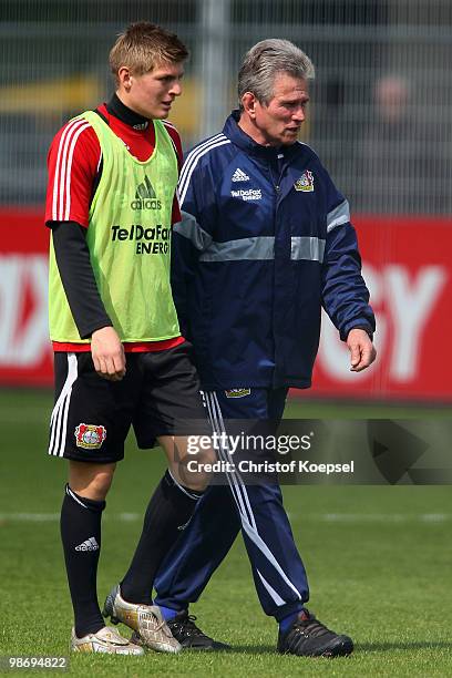 Head coach Jupp Heynckes of Leverkusen and Toni Kroos talk during the training session of Bayer Leverkusen at the training ground on April 27, 2010...