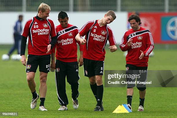 Lukas Sinkiewicz, Arturo Vidal, Lars Bender and Gonzalo Castro attend the training session of Bayer Leverkusen at the training ground on April 27,...