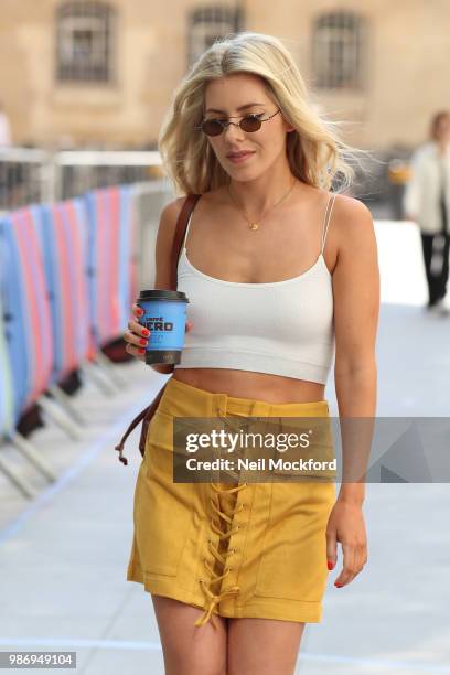 Mollie King seen arriving at BBC Radio One on June 29, 2018 in London, England.