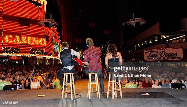 Dave Haywood, Charles Kelley and Hillary Scott of the band Lady Antebellum perform during the Academy of Country Music all-star concert at the...