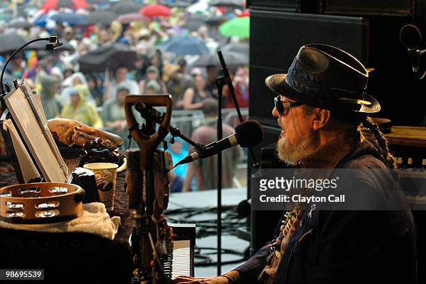 Dr John performs for rain-soaked fans at the Gentilly Stage on day one of New Orleans Jazz & Heritage Festival on April 23, 2010 in New Orleans,...