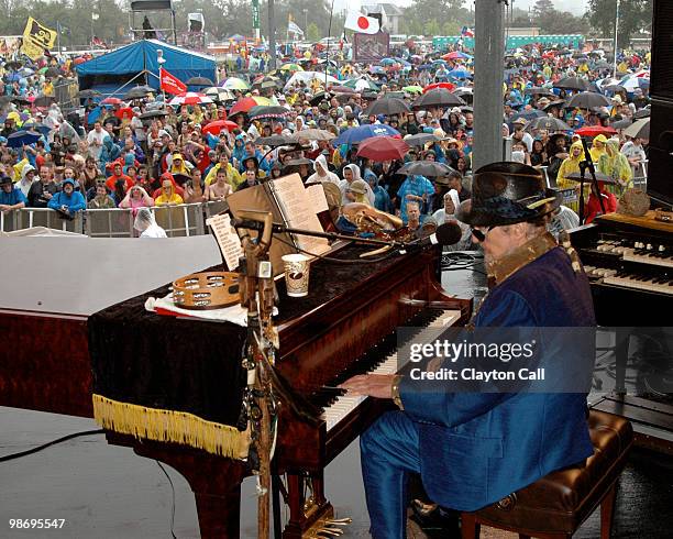 Dr John performs for rain-soaked fans at the Gentilly Stage on day one of New Orleans Jazz & Heritage Festival on April 23, 2010 in New Orleans,...