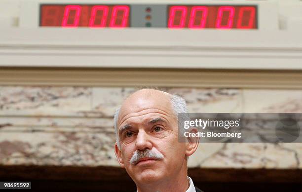 George Papandreou, Greece's prime minister, pauses during a speech to members of the Greek parliament at the Senate Hall in Athens, Greece, on...