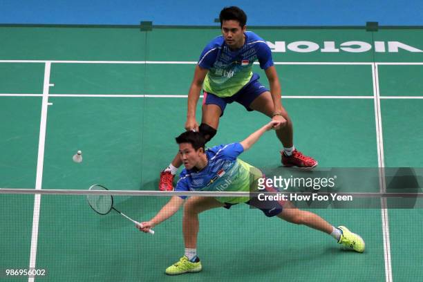 Tontowi Ahmad and Liliyana Natsir of Indonesia in action during Celcom Axiata Badminton Malaysia Open 2018 at Bukit Jalil Stadium, Kuala Lumpur on...