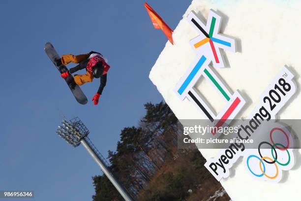 Michael Schaerer from Switzerland in action during the men's big air snowboarding event of the 2018 Winter Olympics in the Alpensia Ski Jumping...