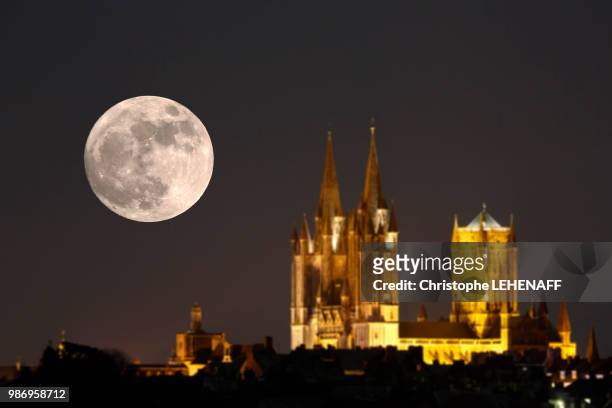 normandy. manche. coutances. super moon 2018. the super moon above the cathedral on january 1st, 2018. focus on the moon. - 2018 lunar stock pictures, royalty-free photos & images