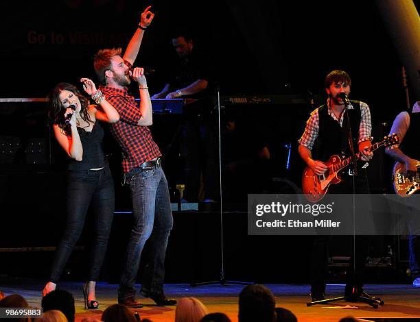 Hillary Scott, Charles Kelley and Dave Haywood of the band Lady Antebellum perform during the Academy of Country Music all-star concert at the...