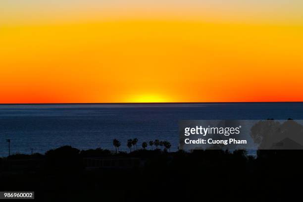 amazing twilight colors at zuma beach, malibu - zuma beach foto e immagini stock