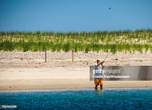 sandy neck surf casting - surf casting stock pictures, royalty-free photos & images