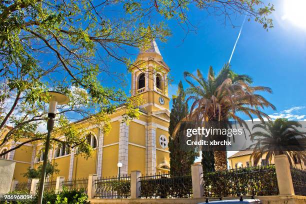 town of novalja church, pag island - novalja stock-fotos und bilder