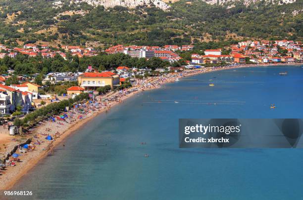 long sand beach in baska, krk island - long beach house stock pictures, royalty-free photos & images