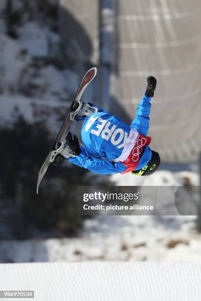 Lee Minsik from South Korea in action during the men's big air snowboarding event of the 2018 Winter Olympics in the Alpensia Ski Jumping Centre in...