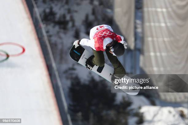Clemens Millauer from Austria in action during the men's big air snowboarding event of the 2018 Winter Olympics in the Alpensia Ski Jumping Centre in...
