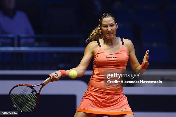 Shahar Peer of Isarel plays a forehand during her first round match against Polona Hercog of Slovenia at day two of the WTA Porsche Tennis Grand Prix...