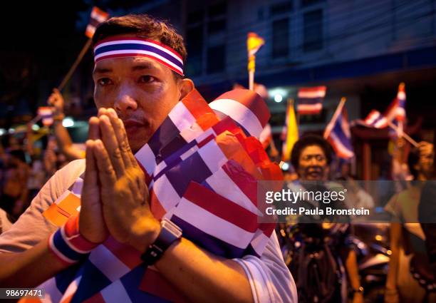 Pro-government protester prays during rally in support of the Thai government and against the red shirts April 27, 2010 in Bangkok Thailand....
