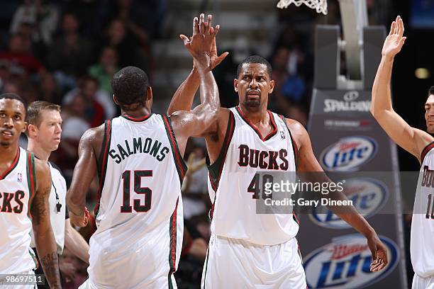 Kurt Thomas and John Salmons of the Milwaukee Bucks celebrate during the game against the Atlanta Hawks on April 12, 2010 at the Bradley Center in...