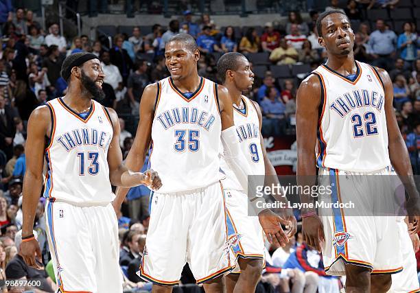 James Harden, Kevin Durant, Serge Ibaka and Jeff Green of the Oklahoma City Thunder on the court during the game against the Memphis Grizzlies at...