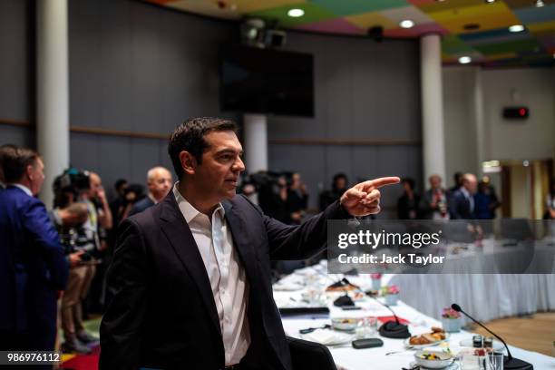 Prime Minister of Greece Alexis Tsipras arrives ahead of roundtable discussions on the final day of the European Council leaders' summit on June 29,...