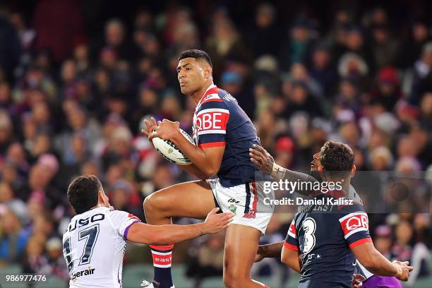 Daniel Tupou of the Roosters marks the ball during the round 16 NRL match between the Sydney Roosters and the Melbourne Storm at Adelaide Oval on...