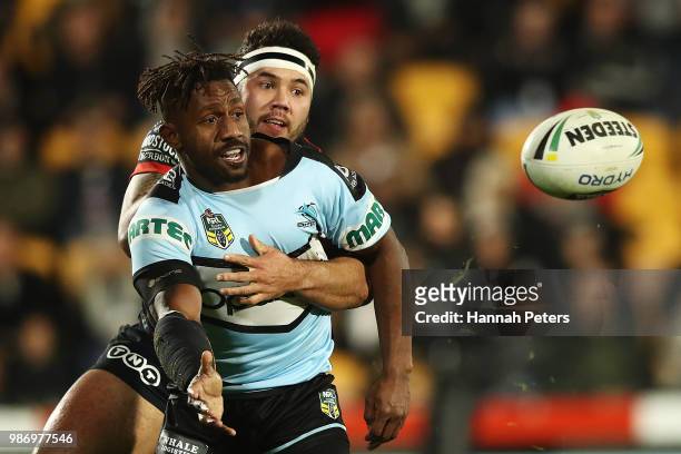 James Segeyaro of the Sharks offloads the ball during the round 16 NRL match between the New Zealand Warriors and the Cronulla Sharks at Mt Smart...