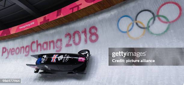 Pilot Mica McNeill and pusher Mica Moore from the UK sliding down the ice track during the women's two-woman bobsleigh event of the 2018 Winter...