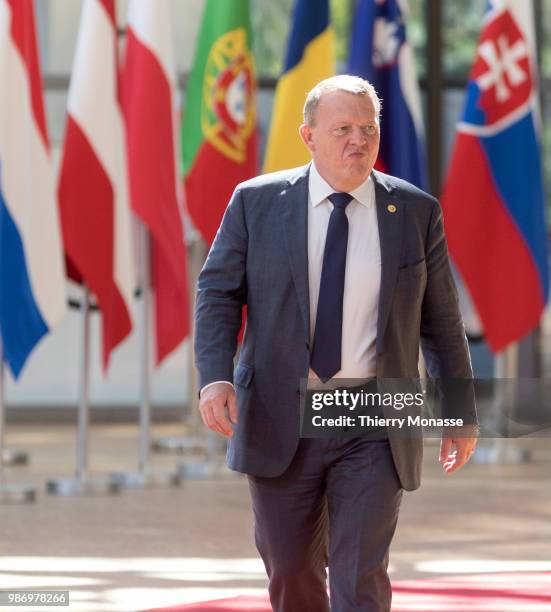 Danish Prime Minister Lars Lokke Rasmussen arrives to take part in the second day of the European Union leaders' summit, without Britain, to discuss...