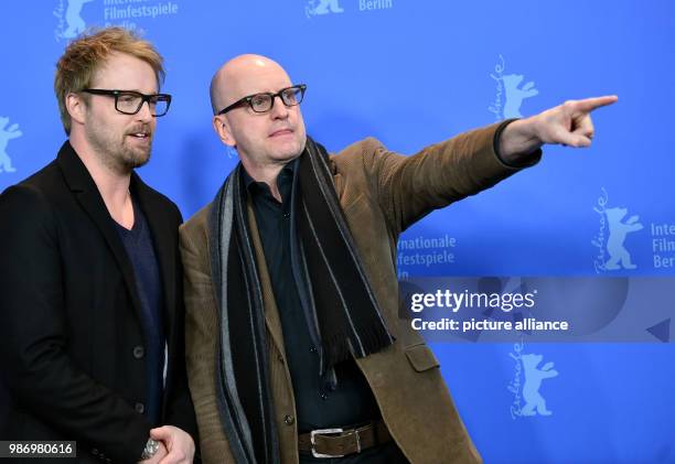 February 2018, Germany, Berlin: Berlinale 2018, photocall, 'Unsane': Actor Joshua Leonard and director Steven Soderbergh. The film runs in the...