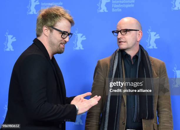 February 2018, Germany, Berlin: Berlinale 2018, photocall, 'Unsane': Actor Joshua Leonard and director Steven Soderbergh. The film runs in the...