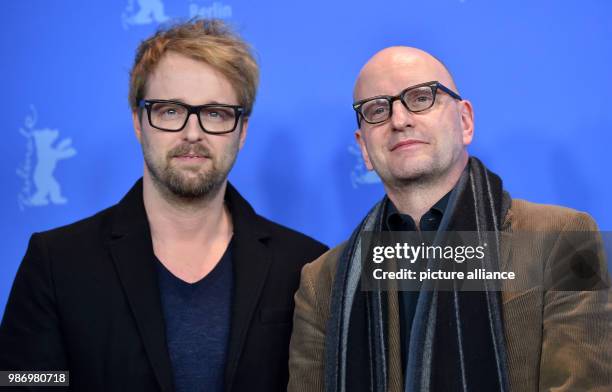 February 2018, Germany, Berlin: Berlinale 2018, photocall, 'Unsane': Actor Joshua Leonard and director Steven Soderbergh. The film runs in the...