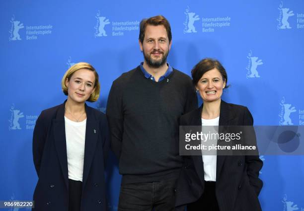 February 2018, Germany, Berlin: Berlinale 2018, photocall, 'Becoming Astrid', : Actress Alba August , actor Henrik Rafaelsen with director Pernille...