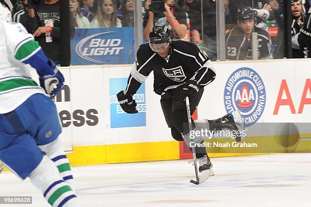Wayne Simmonds of the Los Angeles Kings skates with the puck against the Vancouver Canucks in Game Six of the Western Conference Quarterfinals during...
