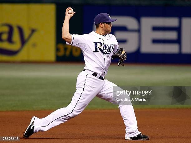 Shortstop Jason Bartlett of the Tampa Bay Rays throws over to first against the Toronto Blue Jays during the game at Tropicana Field on April 24,...