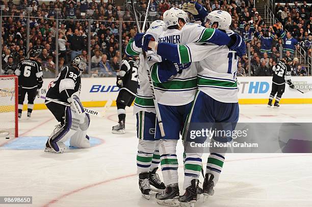 Steve Bernier of the Vancouver Canucks celebrates with teammates after scoring a goal against the Los Angeles Kings in Game Six of the Western...