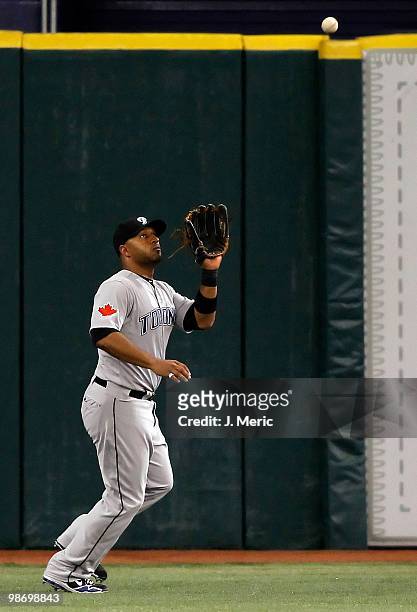 Outfielder Vernon Wells of the Toronto Blue Jays catches a fly ball against the Tampa Bay Rays during the game at Tropicana Field on April 24, 2010...