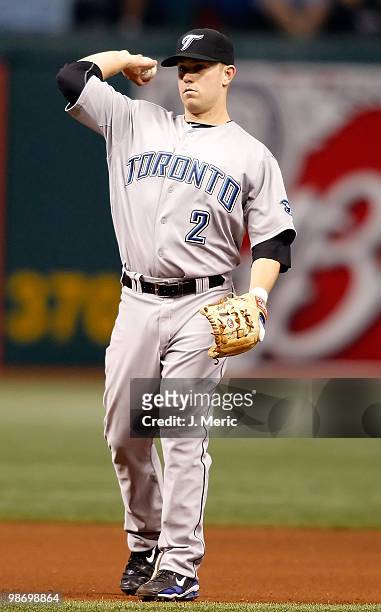 Infielder Aaron Hill of the Toronto Blue Jays makes the throw at second against the Tampa Bay Rays during the game at Tropicana Field on April 24,...