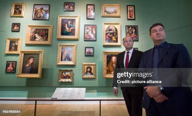 June 2018, Germany, Munich: Albert Fueracker of the Christian Social Union , Finance and Home Minister of Bavaria, and Markus Soeder , Premier of...