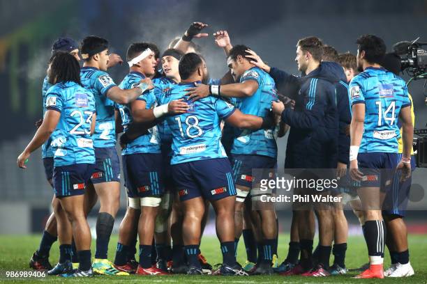 Jerome Kaino of the Blues is farewelled by the team following the round 17 Super Rugby match between the Blues and the Reds at Eden Park on June 29,...