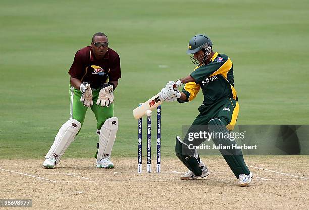 Lindon James of The Windward Islands looks on as Abdul Razzaq of Pakistan scores runs during The ICC T20 World Cup warm up match played at The...