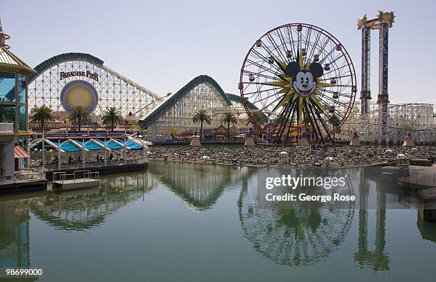 The amusement park at Paradise Pier with "California Screamin'" roller coaster and "Mickey's Fun Wheel" in Disney's California Adventure are viewed...