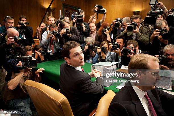 Fabrice Tourre, executive director of structured products group trading with Goldman Sachs Group Inc., takes his seat before a Senate Homeland...