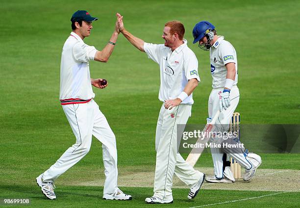 Andrew McDonald of Leicestershire celebrates with team mate Will Jefferson after dismissing Chris Nash of Sussex during the LV County Championship...