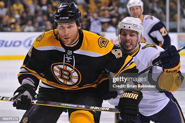 Dennis Wideman of the Boston Bruins watches the play against the Buffalo Sabres in Game Six of the Eastern Conference Quarterfinals during the 2010...