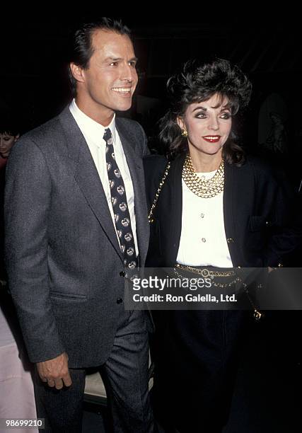 Actor Michael Nader and actress Joan Collins on the set of "Dynasty" for 200th Episode Taping and Celebration on December 15, 1988 at 20th Century...