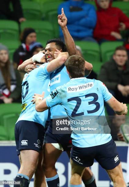 Kurtley Beale of the Waratahs and Bernard Foley of the Waratahs celebrate at the full time siren and winning the round 17 Super Rugby match between...