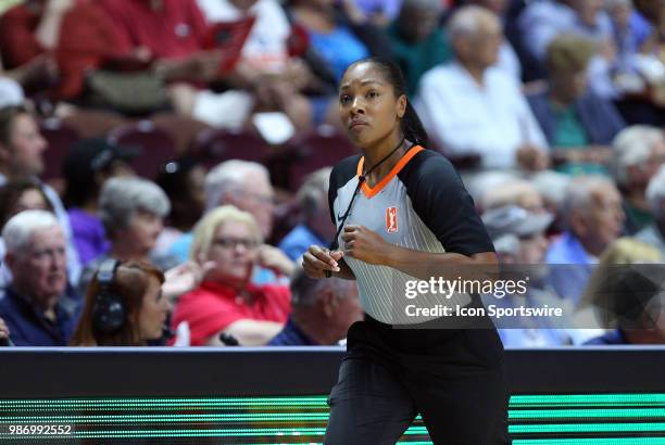 Referee Fatou Cissoko-Stephens during a WNBA game between Indiana Fever and Connecticut Sun on June 27 at Mohegan Sun Arena in Uncasville, CT....