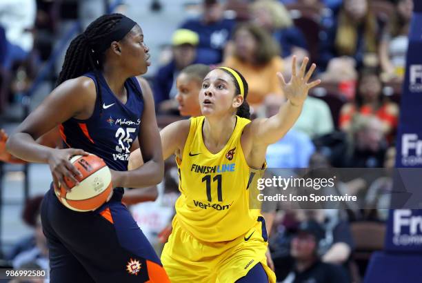 Indiana Fever forward Natalie Achonwa defends Connecticut Sun forward Jonquel Jones during a WNBA game between Indiana Fever and Connecticut Sun on...